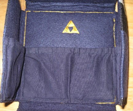 triforce and storage pockets inside