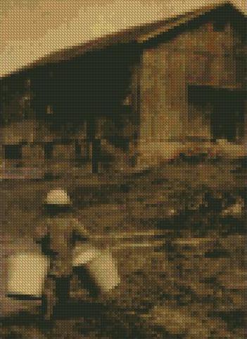 Cross stitch I created from1928 Picture of my husband.JPG