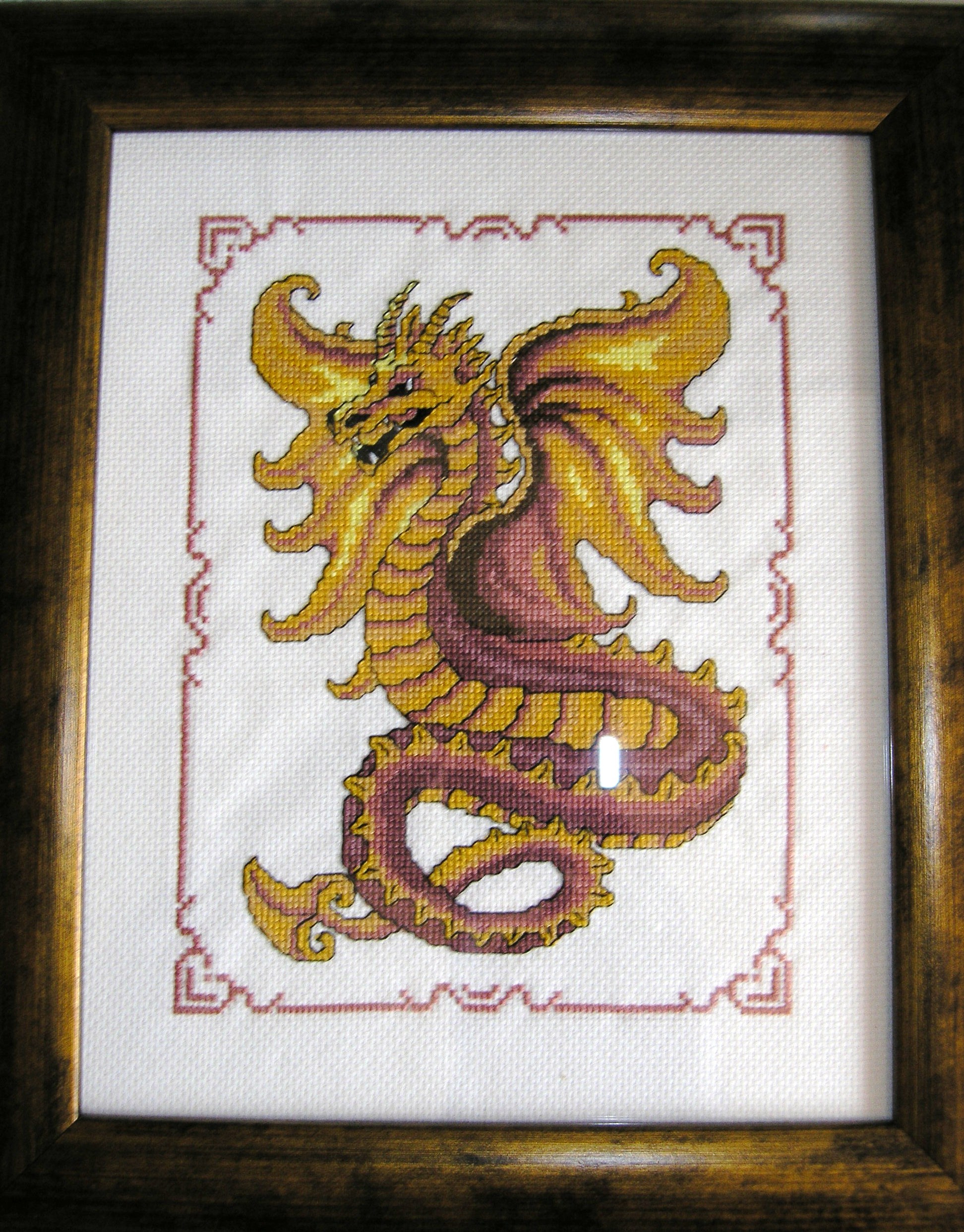 Dragon cross stitch in Frame.