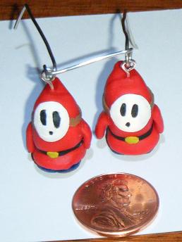 These were the second pair of earrings that I made. Made the one on the left first then made the other.