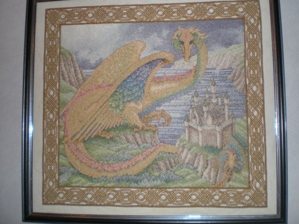 The border in this one is made up of quarter-stitches in three different shades of golden brown.